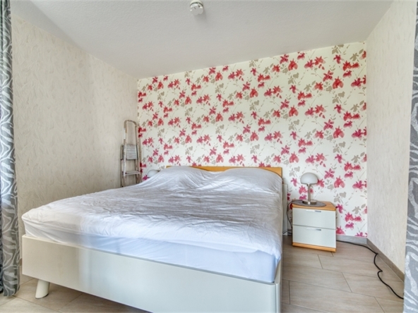 Schlafbereich mit Doppelbett