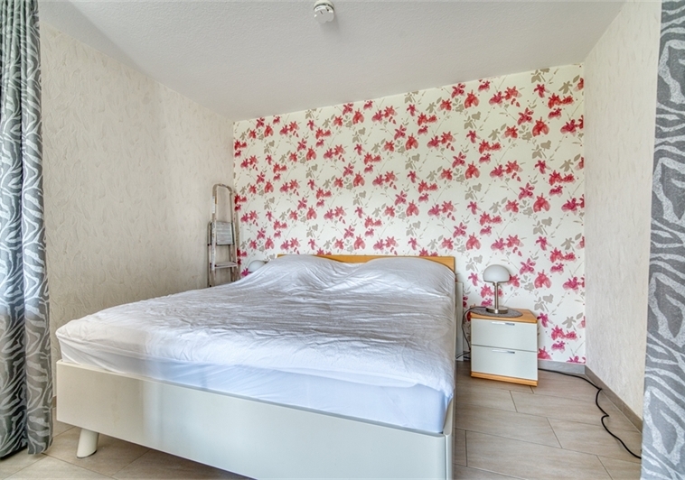 Schlafbereich mit Doppelbett