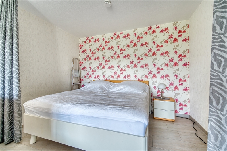 Schlafbereich mit Doppelbett